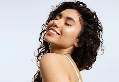 smiling woman with clear skin microdermabrasion